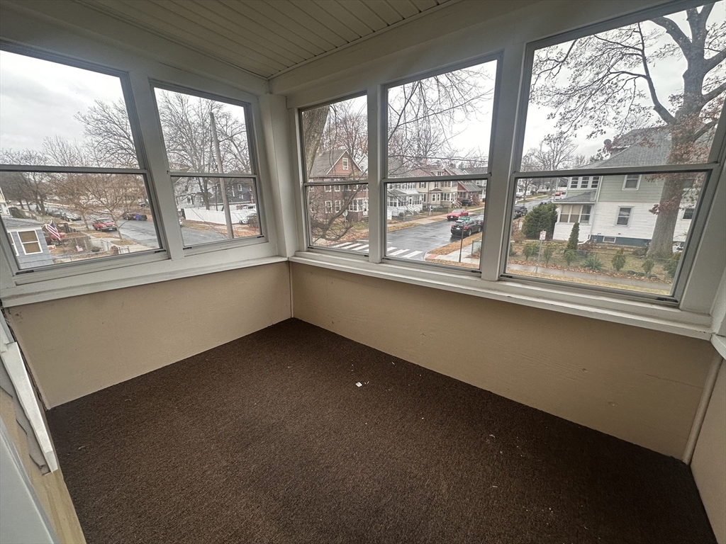 383 Newbury Street, Unit 2 Springfield, MA 01104 - Photo 10 of 11 a view of an empty room with a window