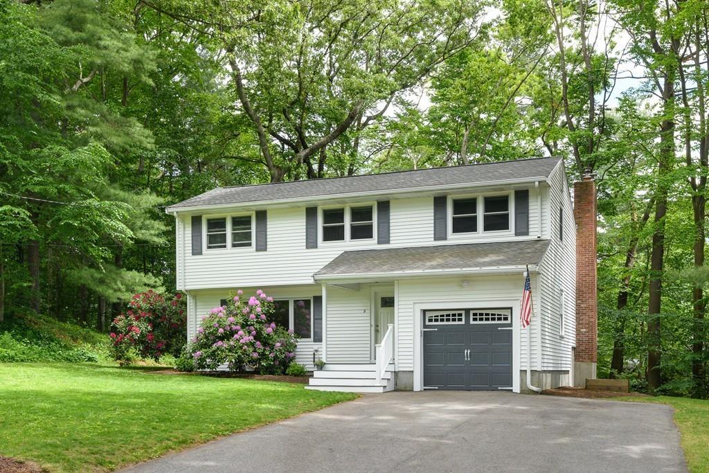 9 Highgate Road Wayland, MA 01778 - Photo 2 of 21 a front view of a house with a garden and yard