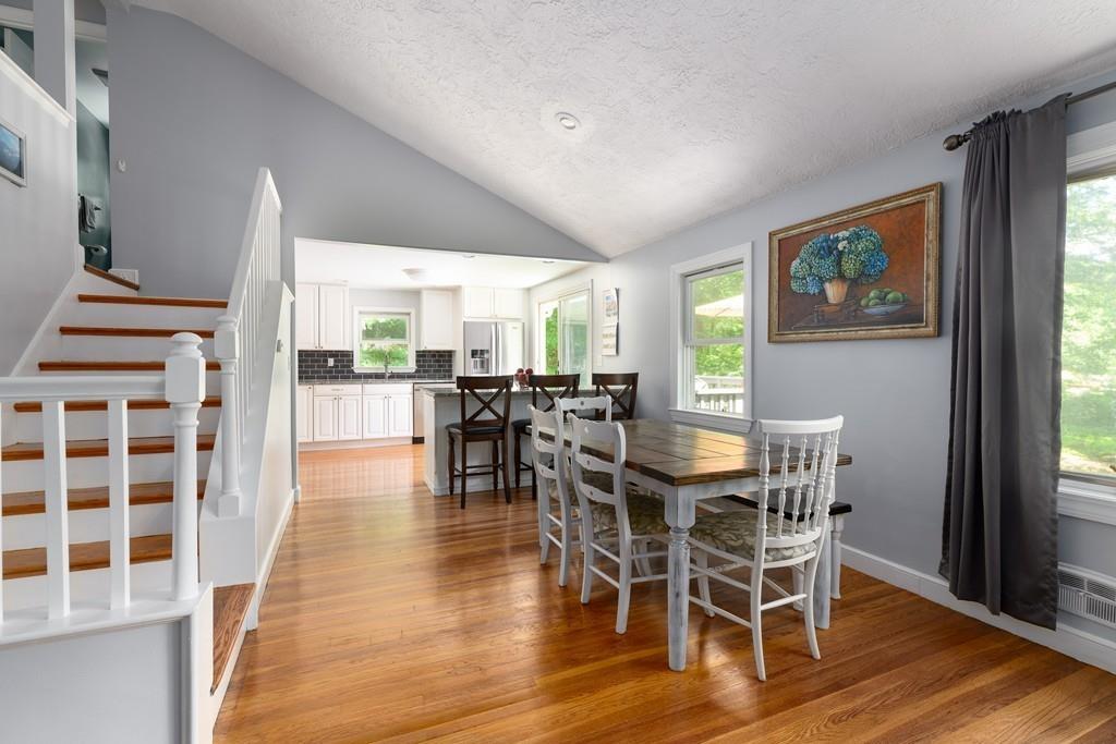 9 Highgate Road Wayland, MA 01778 - Photo 3 of 21 a view of a dining room with furniture and wooden floor