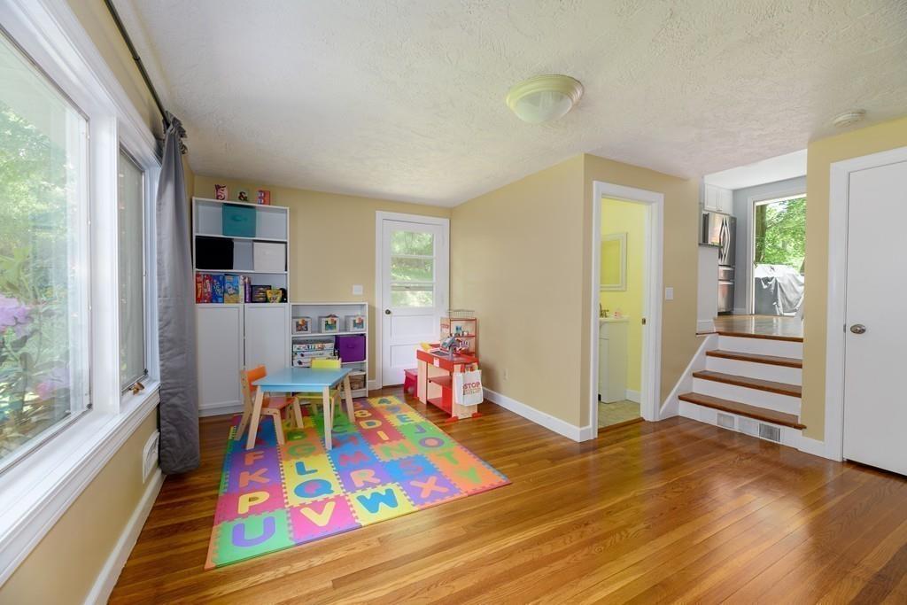 9 Highgate Road Wayland, MA 01778 - Photo 8 of 21 a room with furniture and a wooden floor