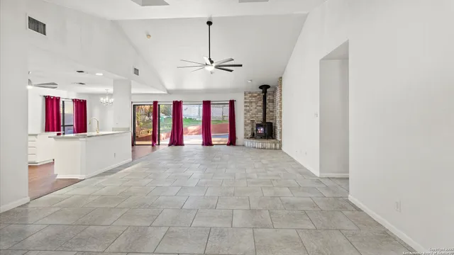 a view of entryway and hall with chandelier