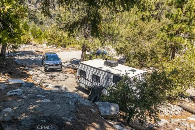 a view of a backyard with sitting area