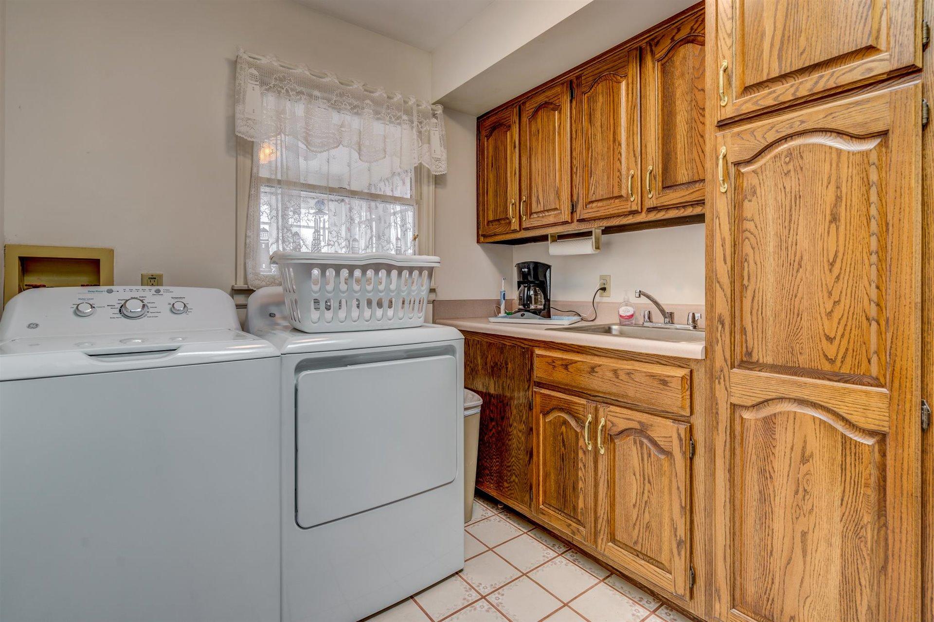 171 Sandy Point Court Union Hall, VA 24176 - Photo 18 of 65 a utility room with dryer and washer