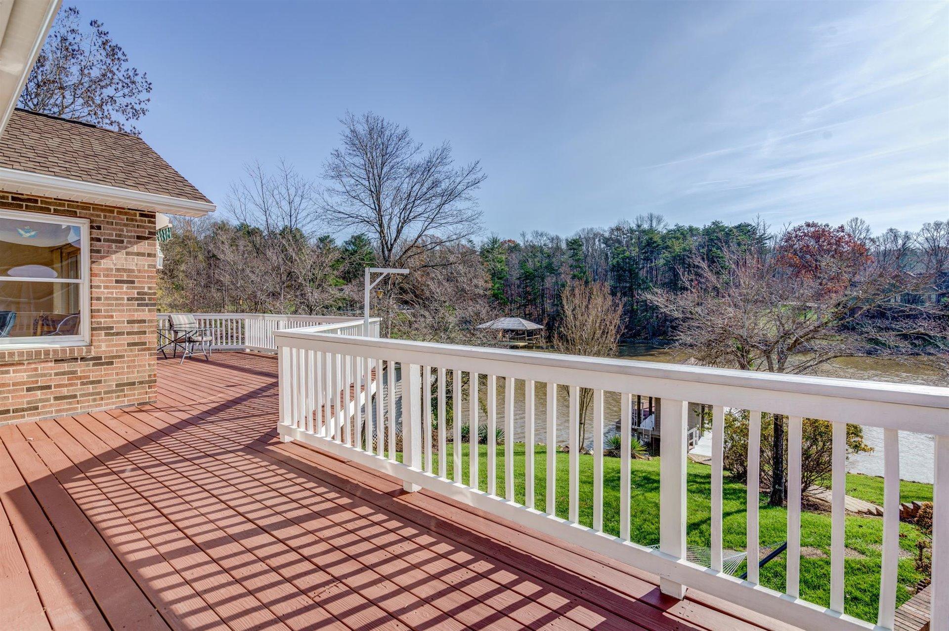 171 Sandy Point Court Union Hall, VA 24176 - Photo 21 of 65 a view of a two chairs on the roof deck