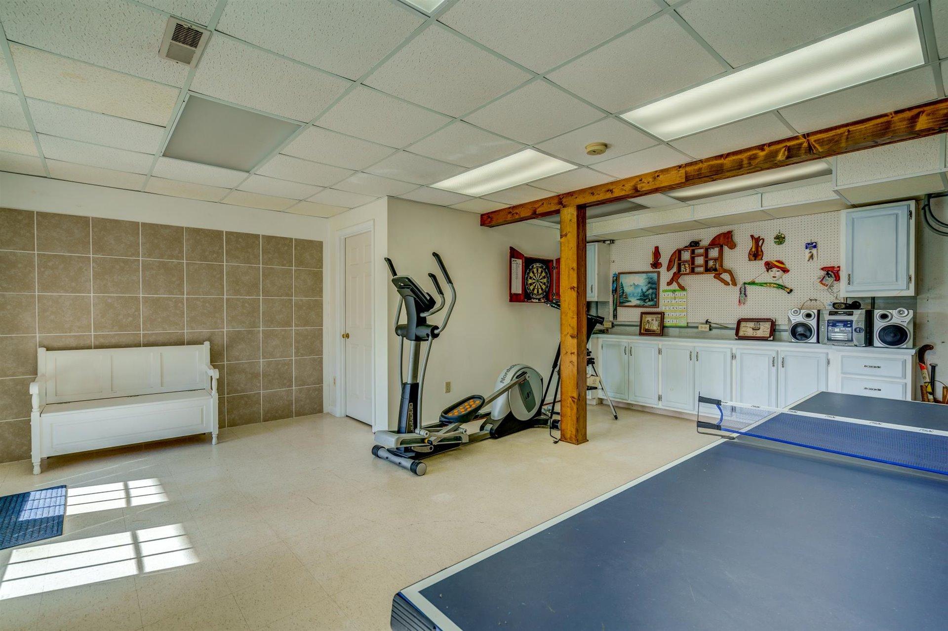 171 Sandy Point Court Union Hall, VA 24176 - Photo 39 of 65 a view of a room with gym equipment