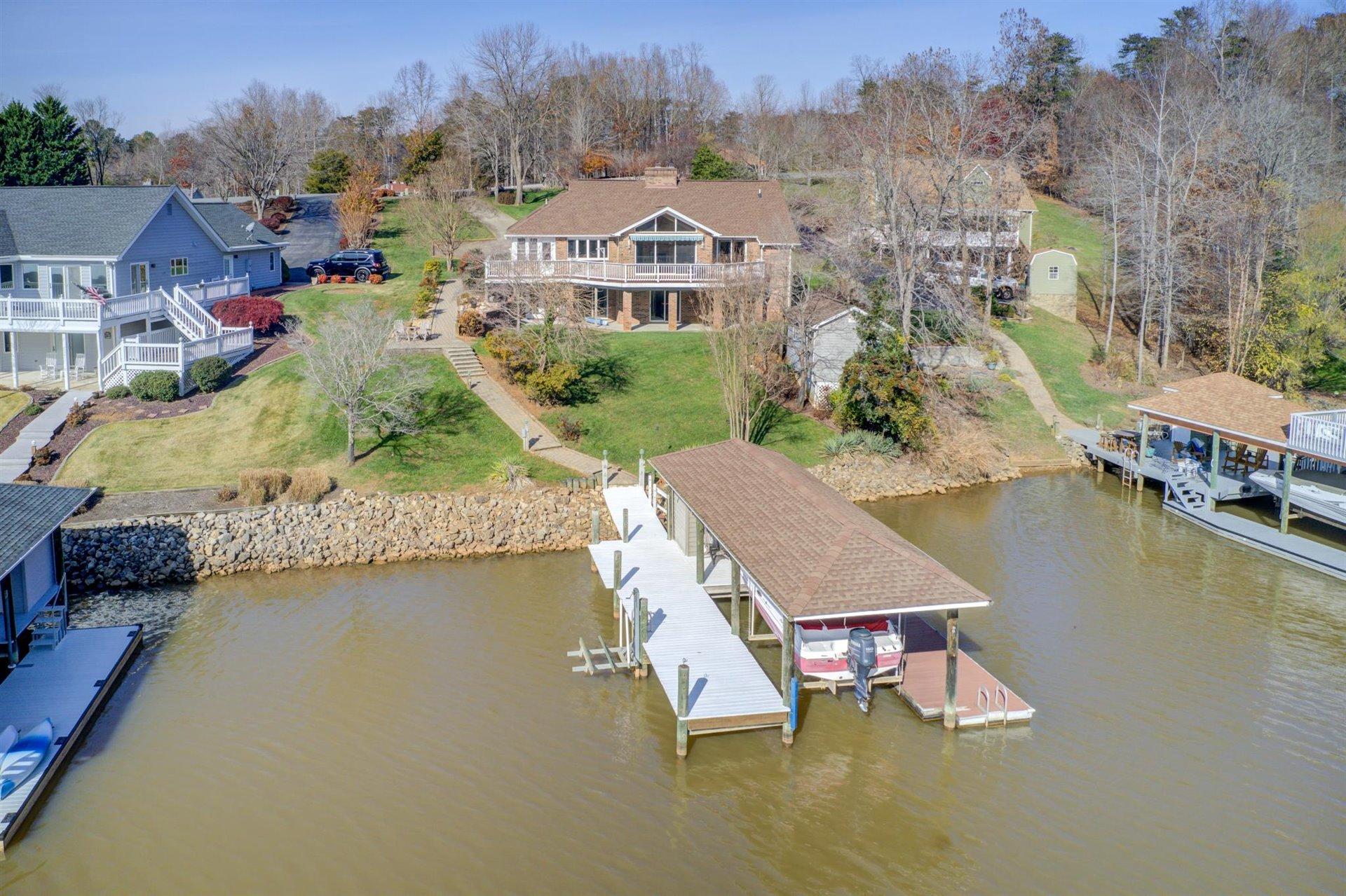 171 Sandy Point Court Union Hall, VA 24176 - Photo 61 of 65 an aerial view of residential houses with outdoor space and swimming pool