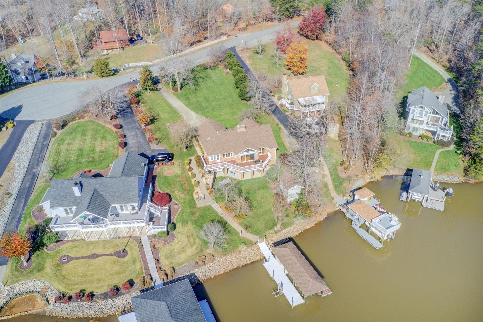 171 Sandy Point Court Union Hall, VA 24176 - Photo 62 of 65 an aerial view of a house a yard and a fire pit