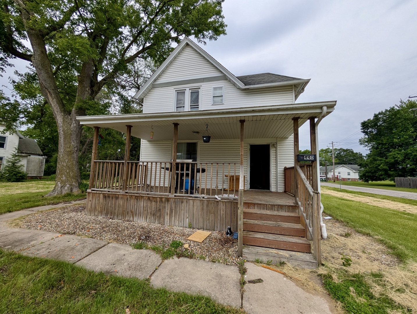front view of a house with a yard