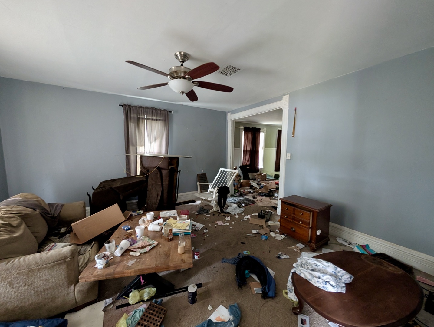 440 North Campbell Street Macomb, IL 61455 - Photo 19 of 50 a room with furniture and a chandelier fan