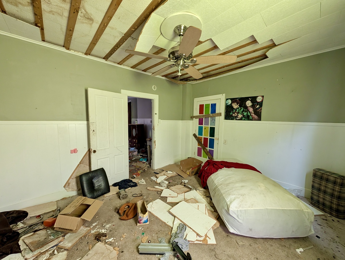 440 North Campbell Street Macomb, IL 61455 - Photo 30 of 50 a bedroom with a bed and ceiling fan