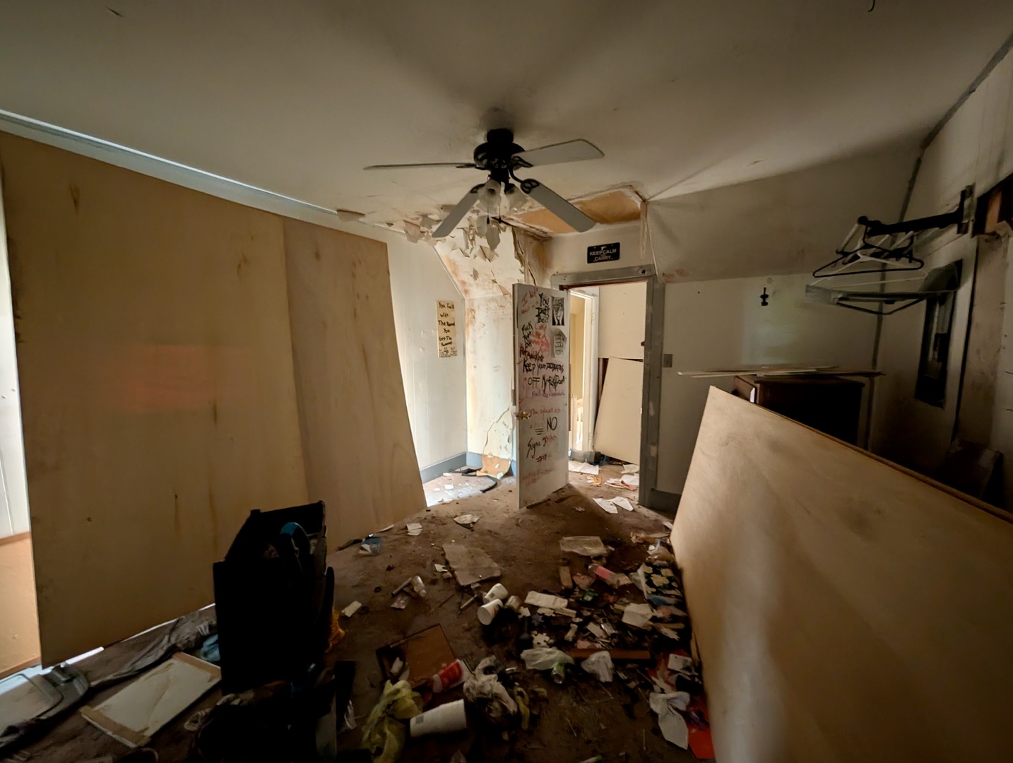 440 North Campbell Street Macomb, IL 61455 - Photo 44 of 50 a bedroom with a bed and a chandelier