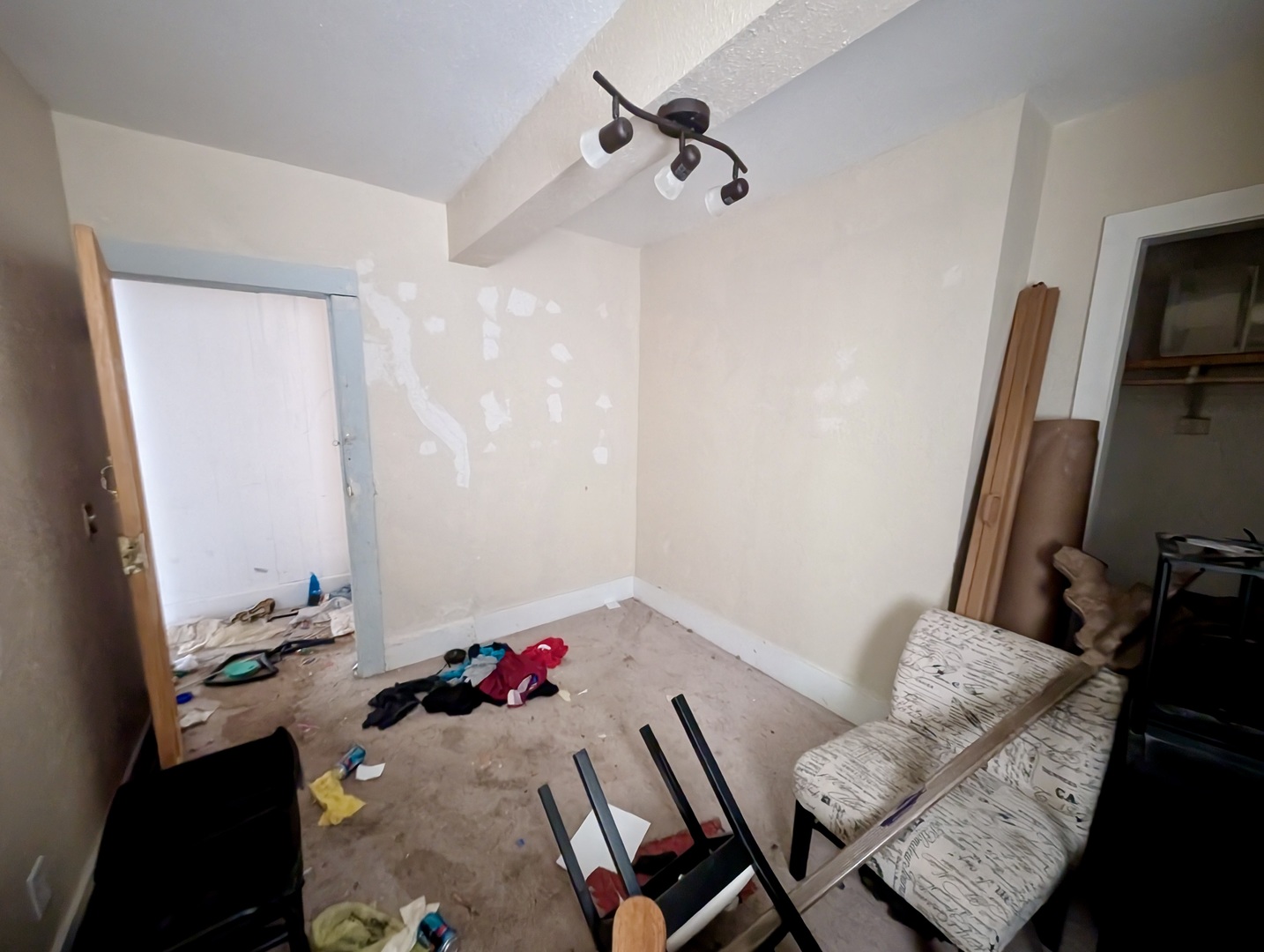 440 North Campbell Street Macomb, IL 61455 - Photo 47 of 50 a living room with furniture and a flat screen tv