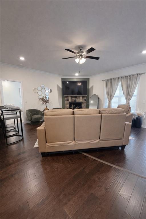 208 Sebastian Cove Hampton, GA 30228 - Photo 8 of 15 a living room with furniture and a chandelier