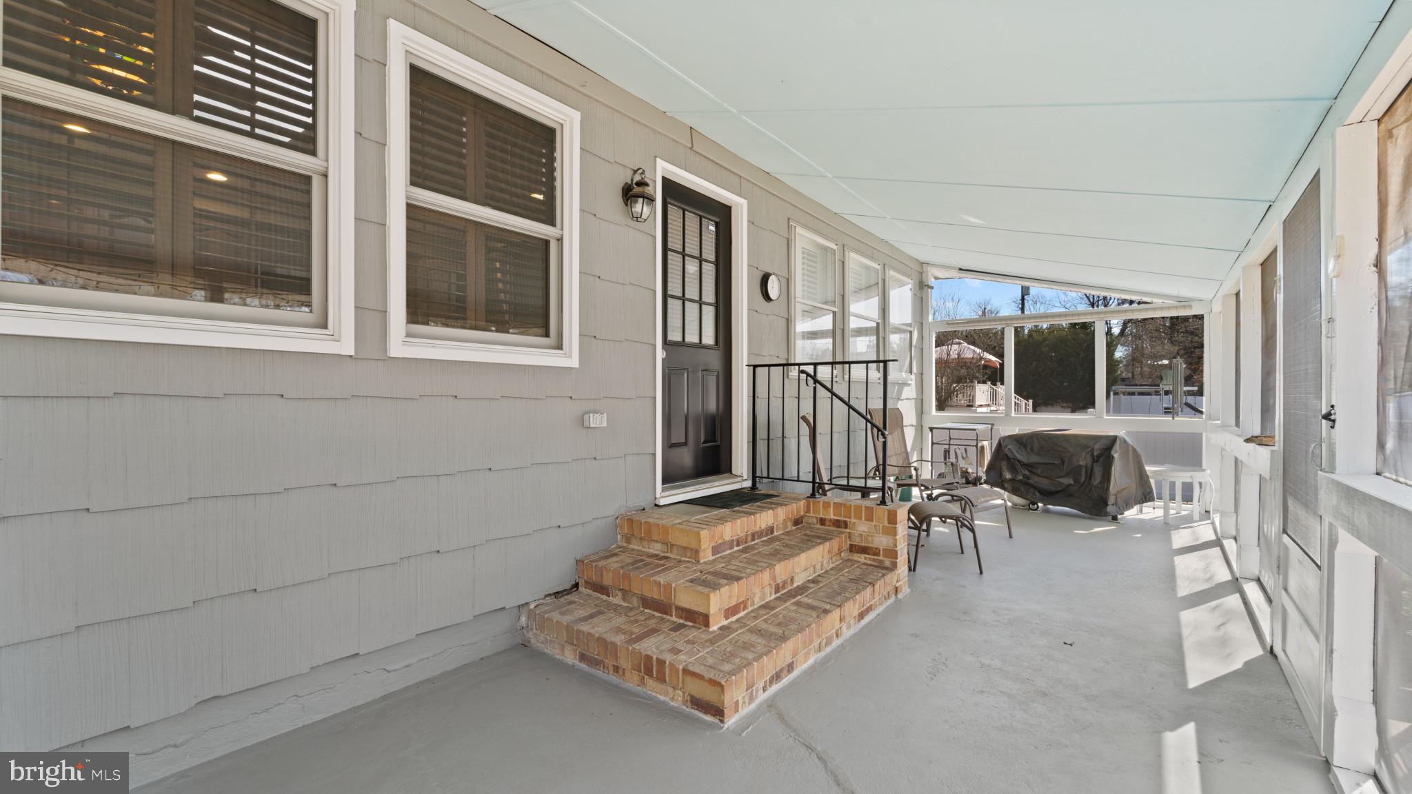 93 Harmony Road Mickleton, NJ 08056 - Photo 20 of 34 a hallway with a couch and a window