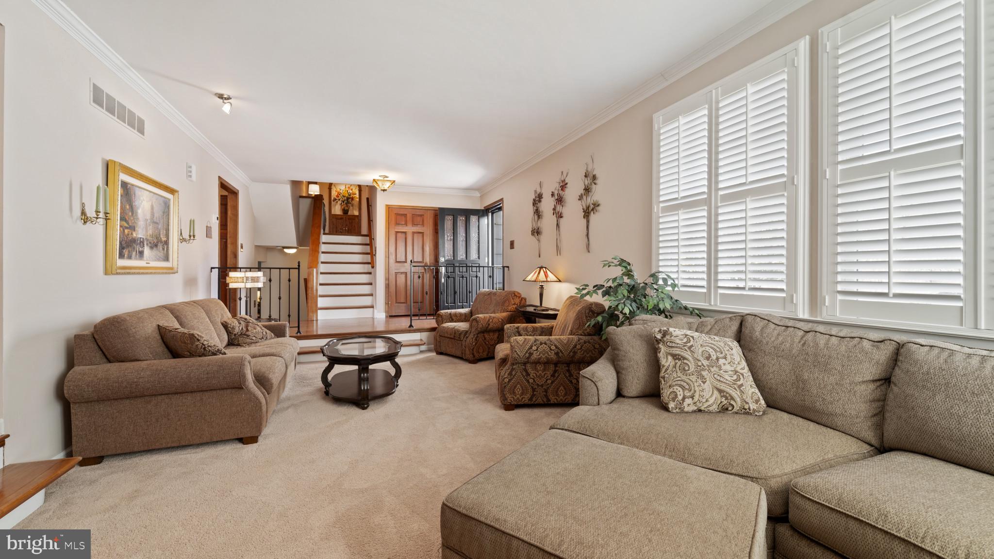 93 Harmony Road Mickleton, NJ 08056 - Photo 5 of 34 a living room with furniture and floor to ceiling windows