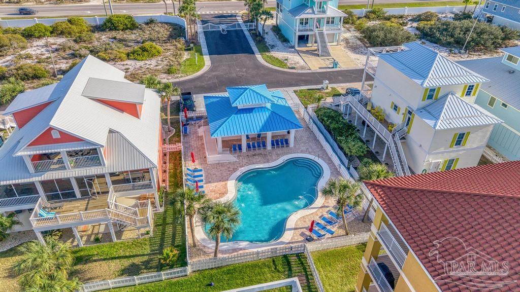 321 Gulfview Lane Perdido Key, FL 32507 - Photo 51 of 57 an aerial view of residential houses with outdoor space and parking