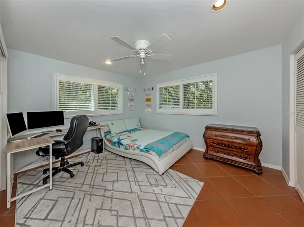a workspace with furniture and window