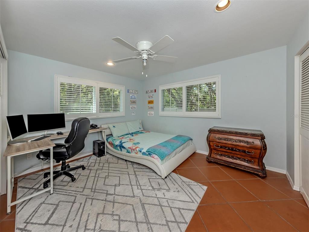 2602 Firetree Lane Venice, FL 34292 - Photo 13 of 31 a workspace with furniture and window