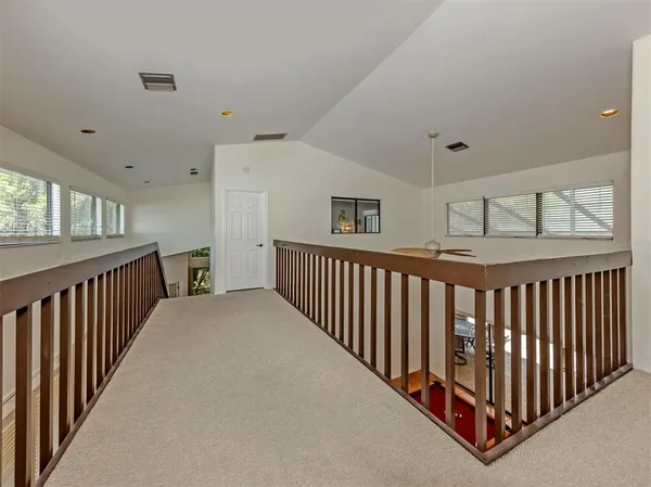 a view of hallway with bedroom