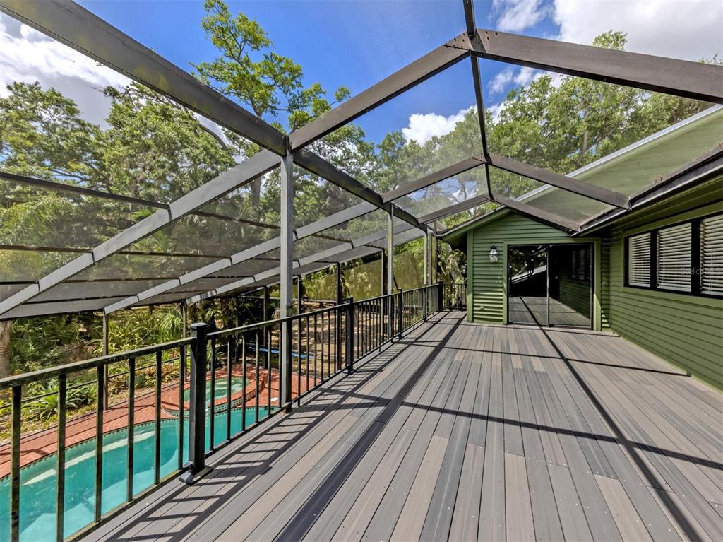 2602 Firetree Lane Venice, FL 34292 - Photo 24 of 31 a view of outdoor space with wooden floor