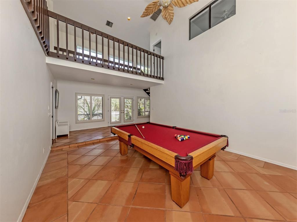 2602 Firetree Lane Venice, FL 34292 - Photo 3 of 31 a room with pool table and windows