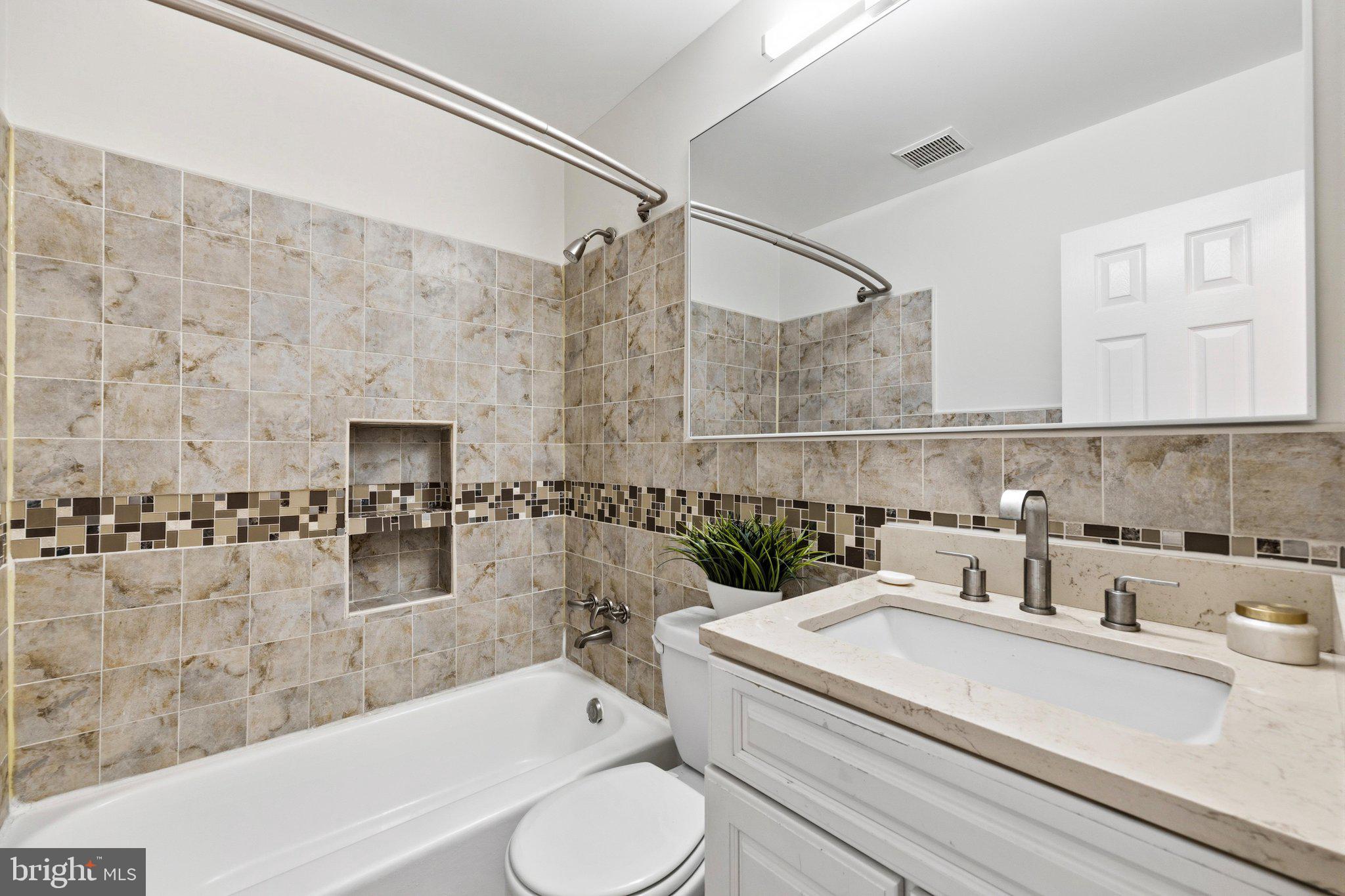 5804 Spell Road Clinton, MD 20735 - Photo 38 of 58 Main level hall bath
