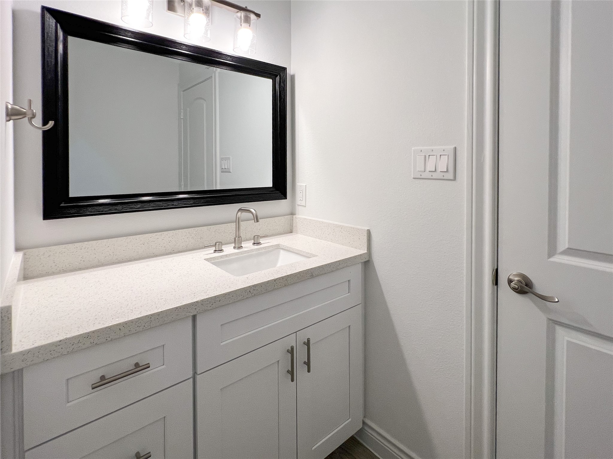 126 Lakeland Circle Rosharon, TX 77583 - Photo 38 of 49 a bathroom with a sink vanity and a mirror