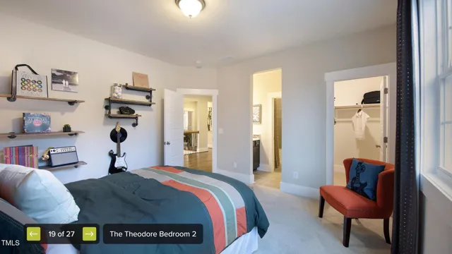 a bedroom with furniture and a lamp