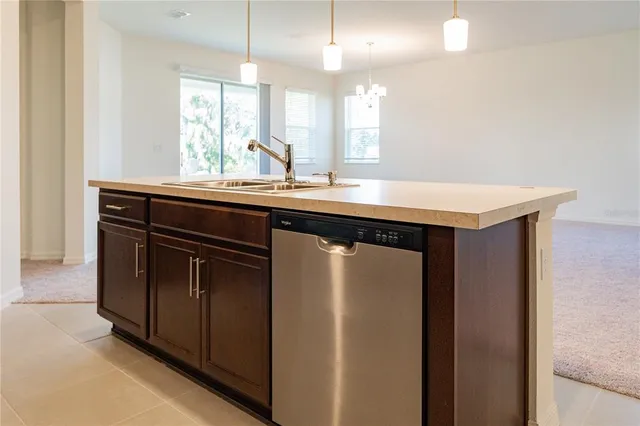 a close view of stove top oven with granite countertops