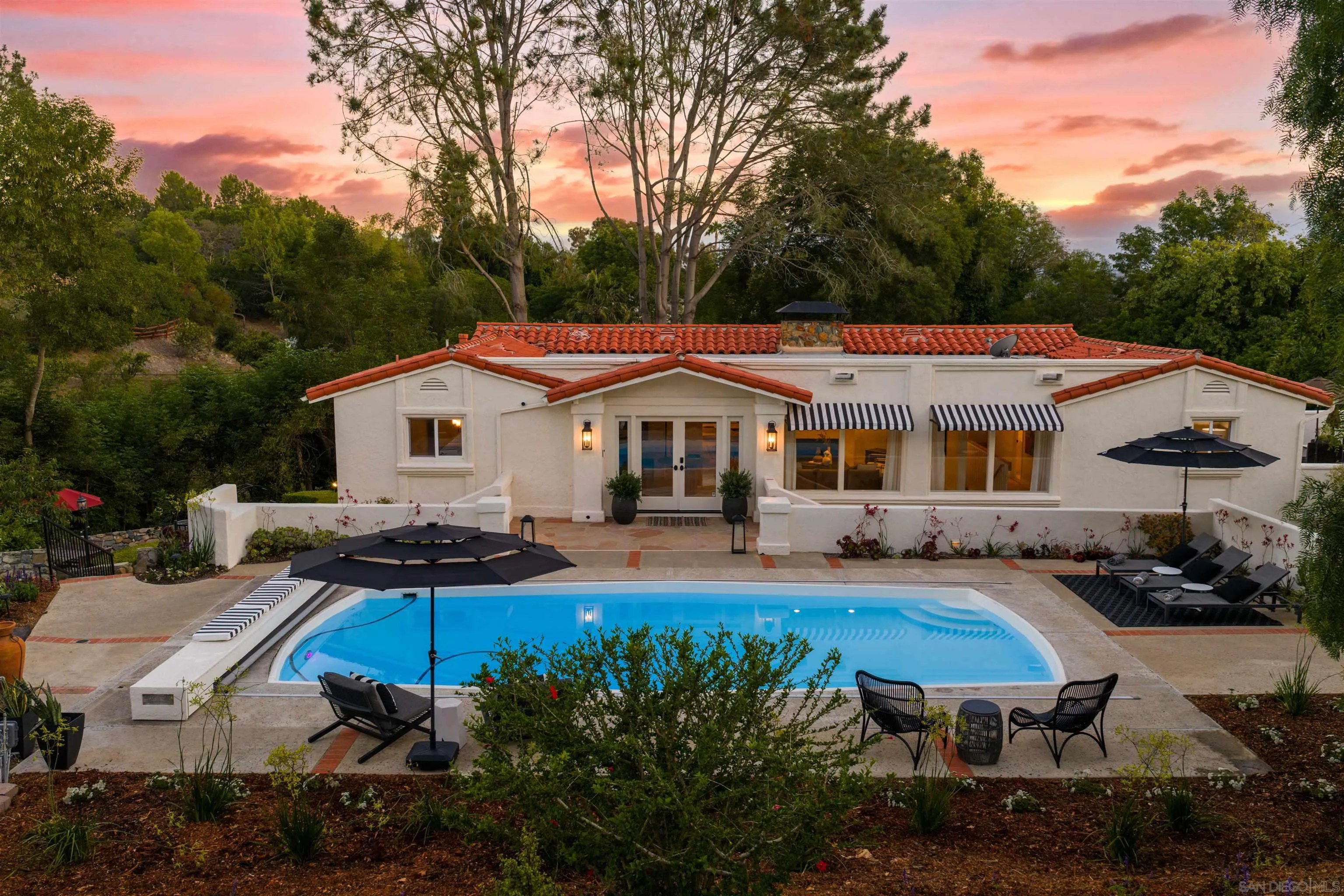 6347 Las Colinas Rancho Santa Fe, CA 92067 - Photo 6 of 24 a house with swimming pool in front of it