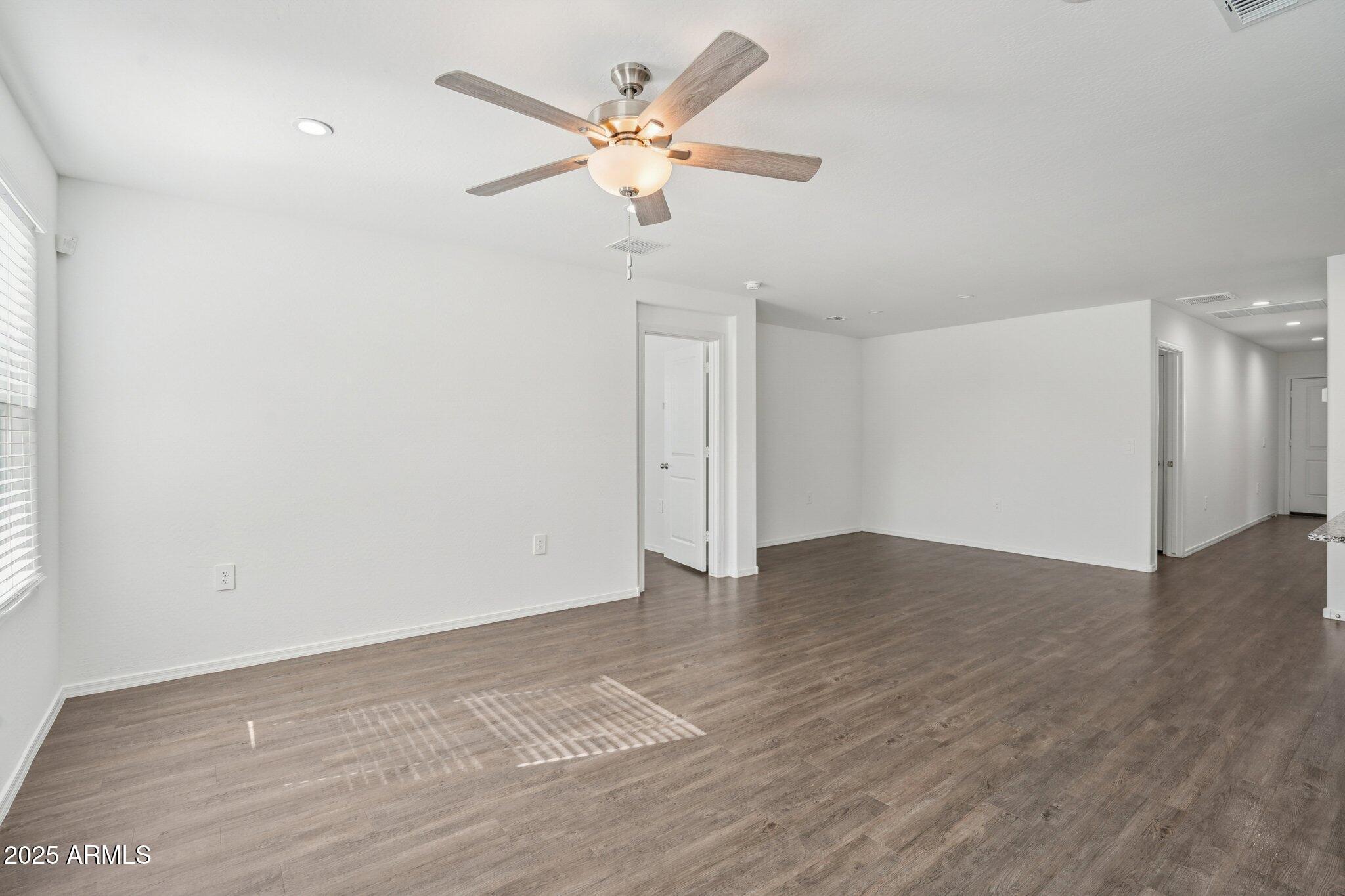1566 East Yeoman Drive Casa Grande, AZ 85122 - Photo 11 of 28 wooden floor in an empty room