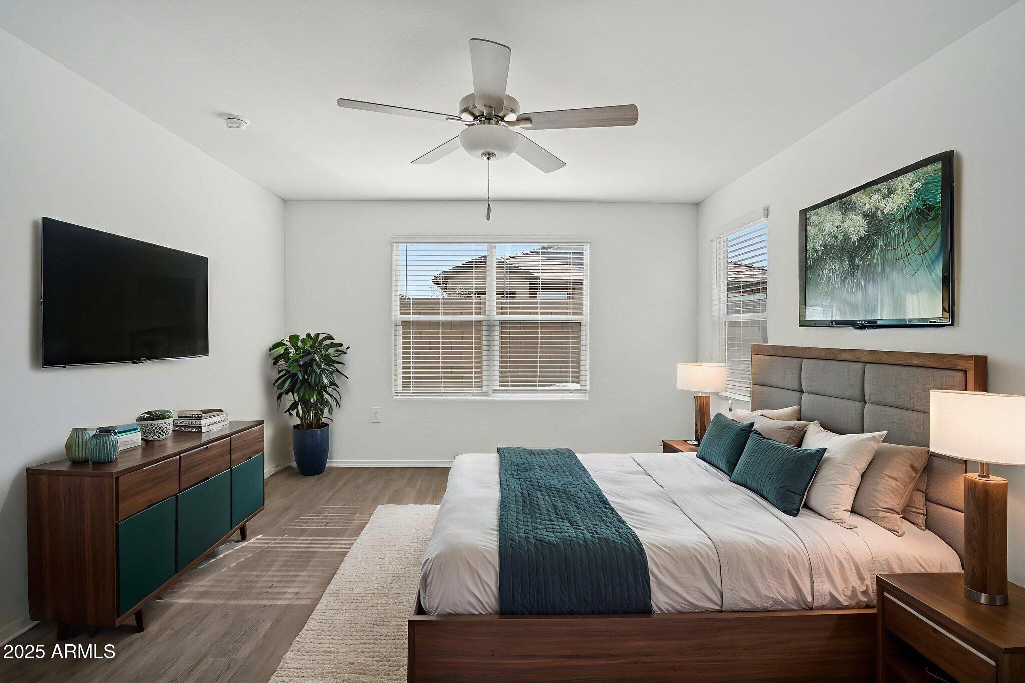 1566 East Yeoman Drive Casa Grande, AZ 85122 - Photo 17 of 28 a bedroom with bed tv and window