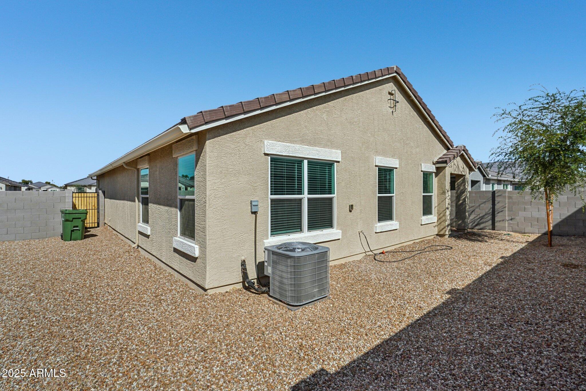 1566 East Yeoman Drive Casa Grande, AZ 85122 - Photo 24 of 28 a view of a house with backyard and sitting area