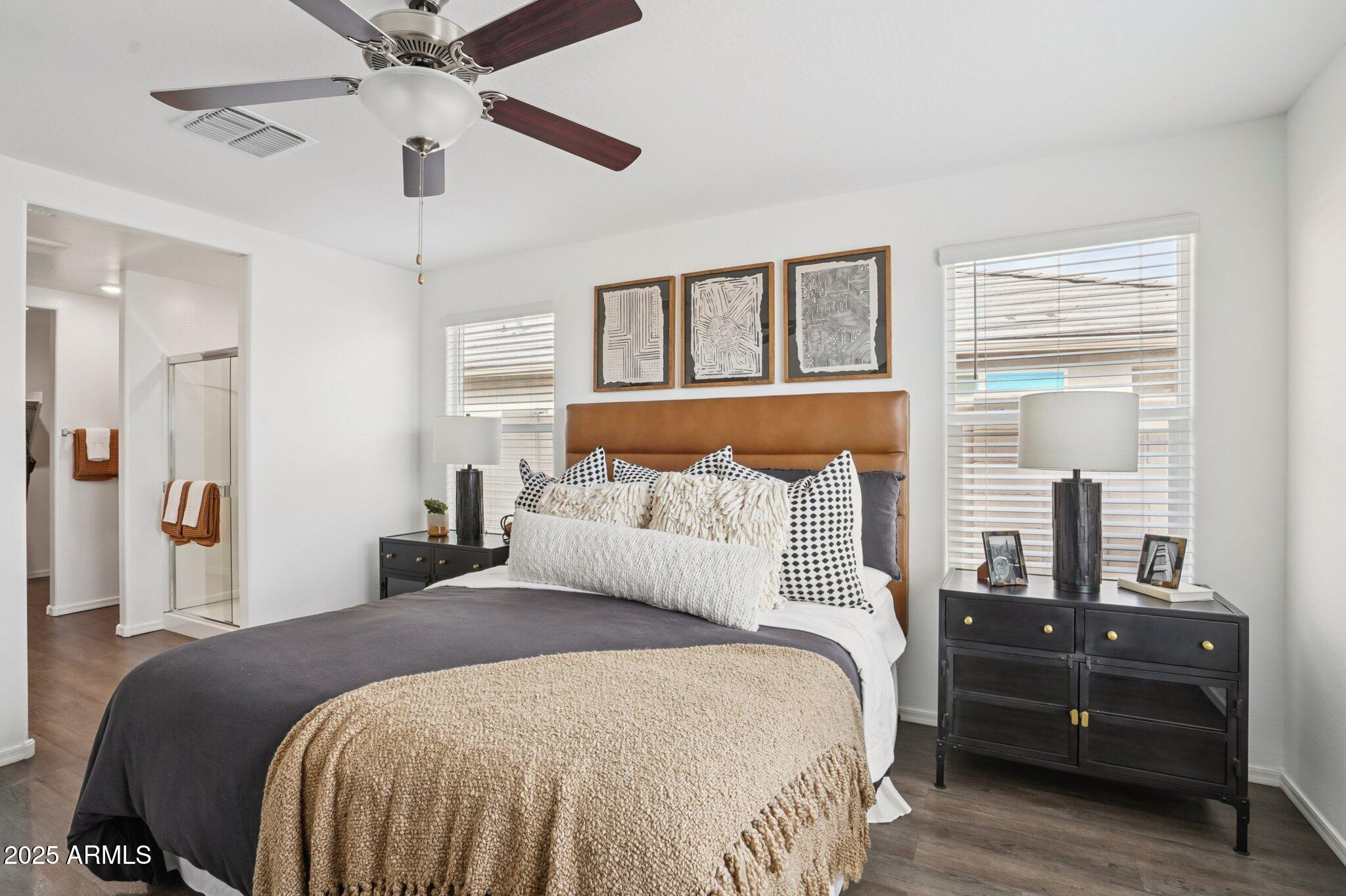1566 East Yeoman Drive Casa Grande, AZ 85122 - Photo 3 of 28 a bedroom with a large bed and a large window