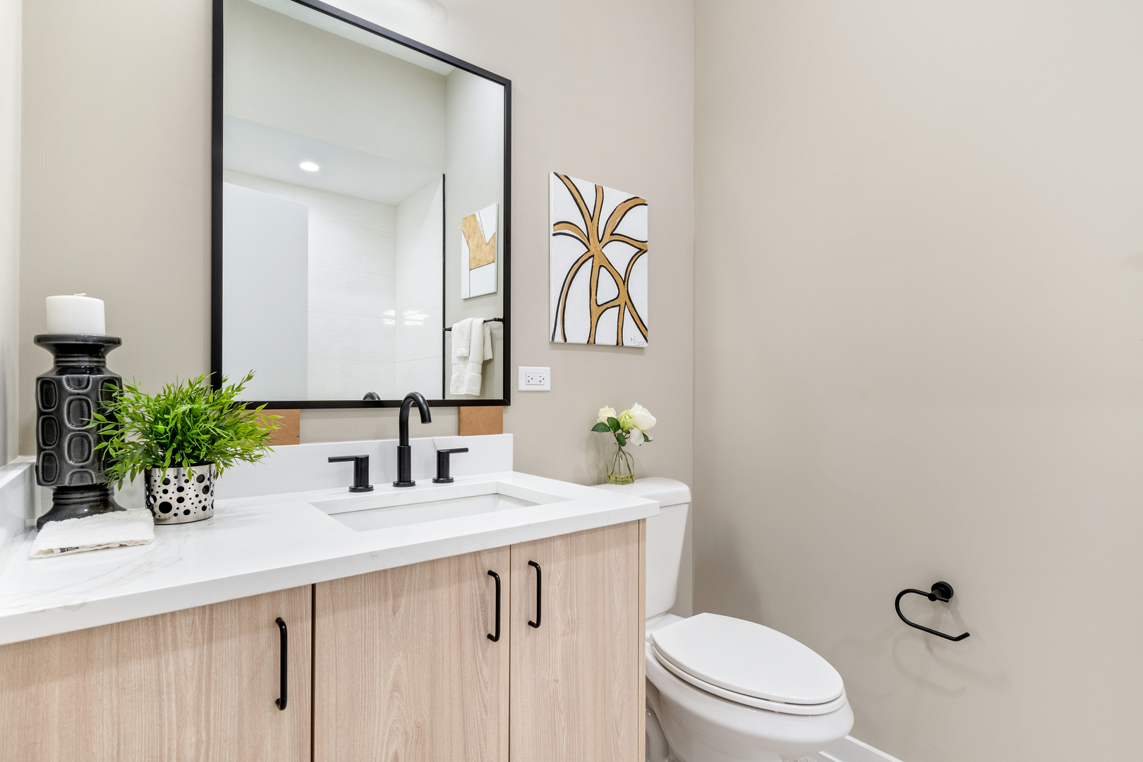 3217 North Clark Street, Unit 504 Chicago, IL 60657 - Photo 15 of 28 a bathroom with a granite countertop sink and a mirror