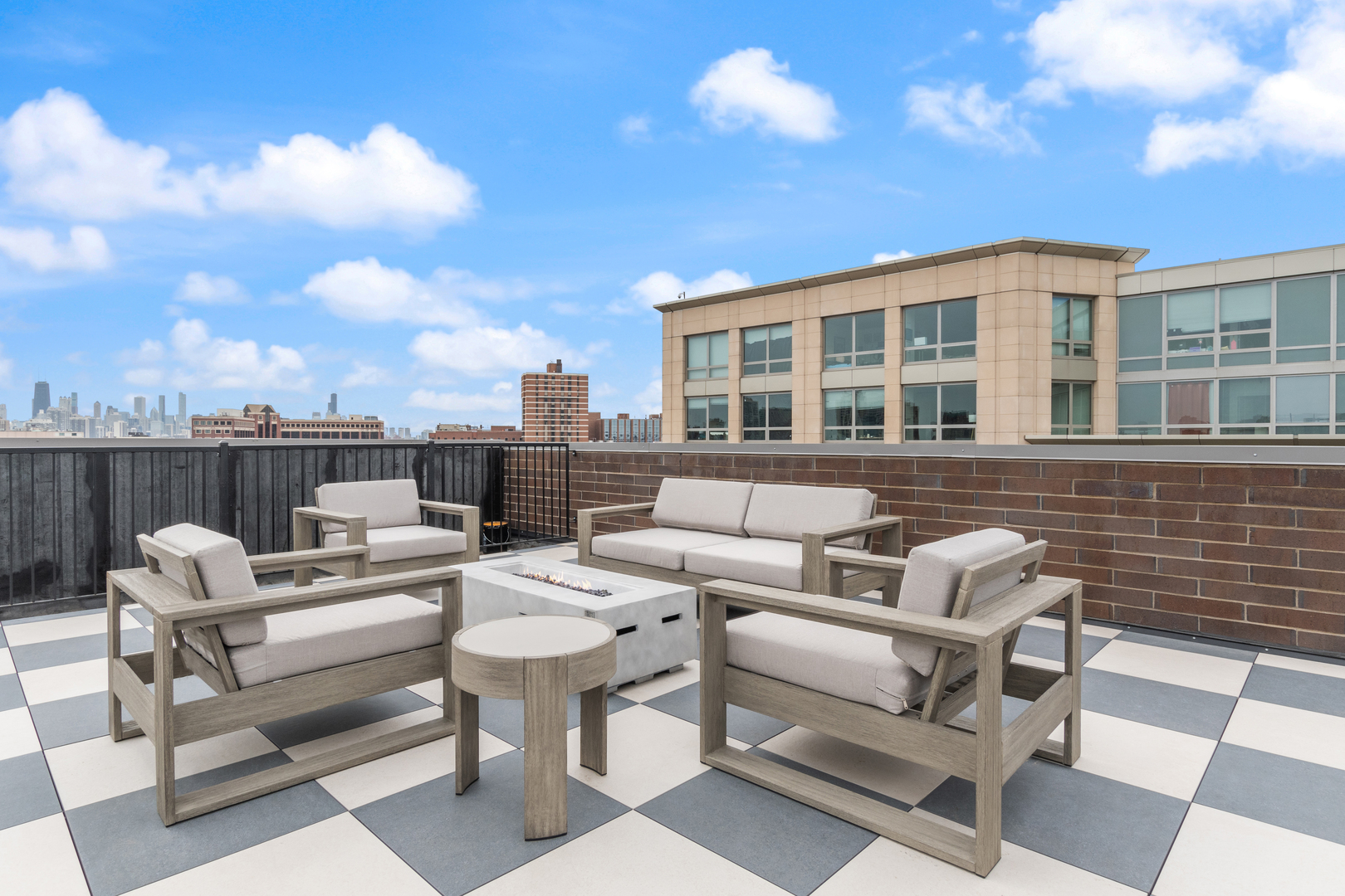 3217 North Clark Street, Unit 504 Chicago, IL 60657 - Photo 23 of 28 a view of a patio with couches and a potted plant