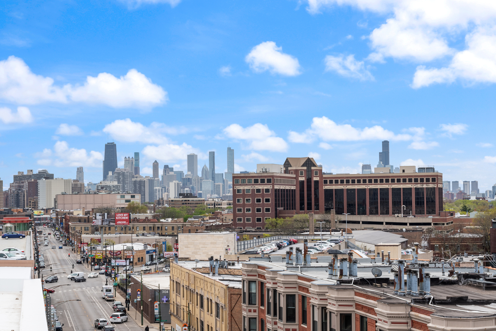 3217 North Clark Street, Unit 504 Chicago, IL 60657 - Photo 25 of 28 a view of a city with tall buildings