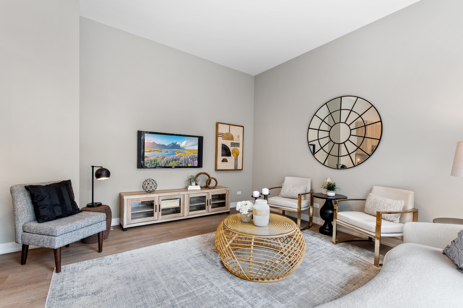 3217 North Clark Street, Unit 504 Chicago, IL 60657 - Photo 8 of 28 a living room with furniture a rug and a wall painting