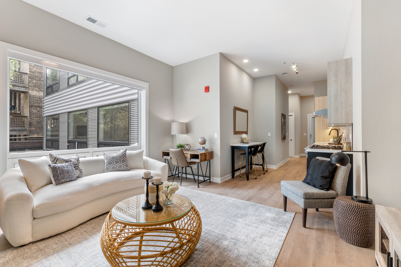 3217 North Clark Street, Unit 504 Chicago, IL 60657 - Photo 9 of 28 a living room with furniture and a large window