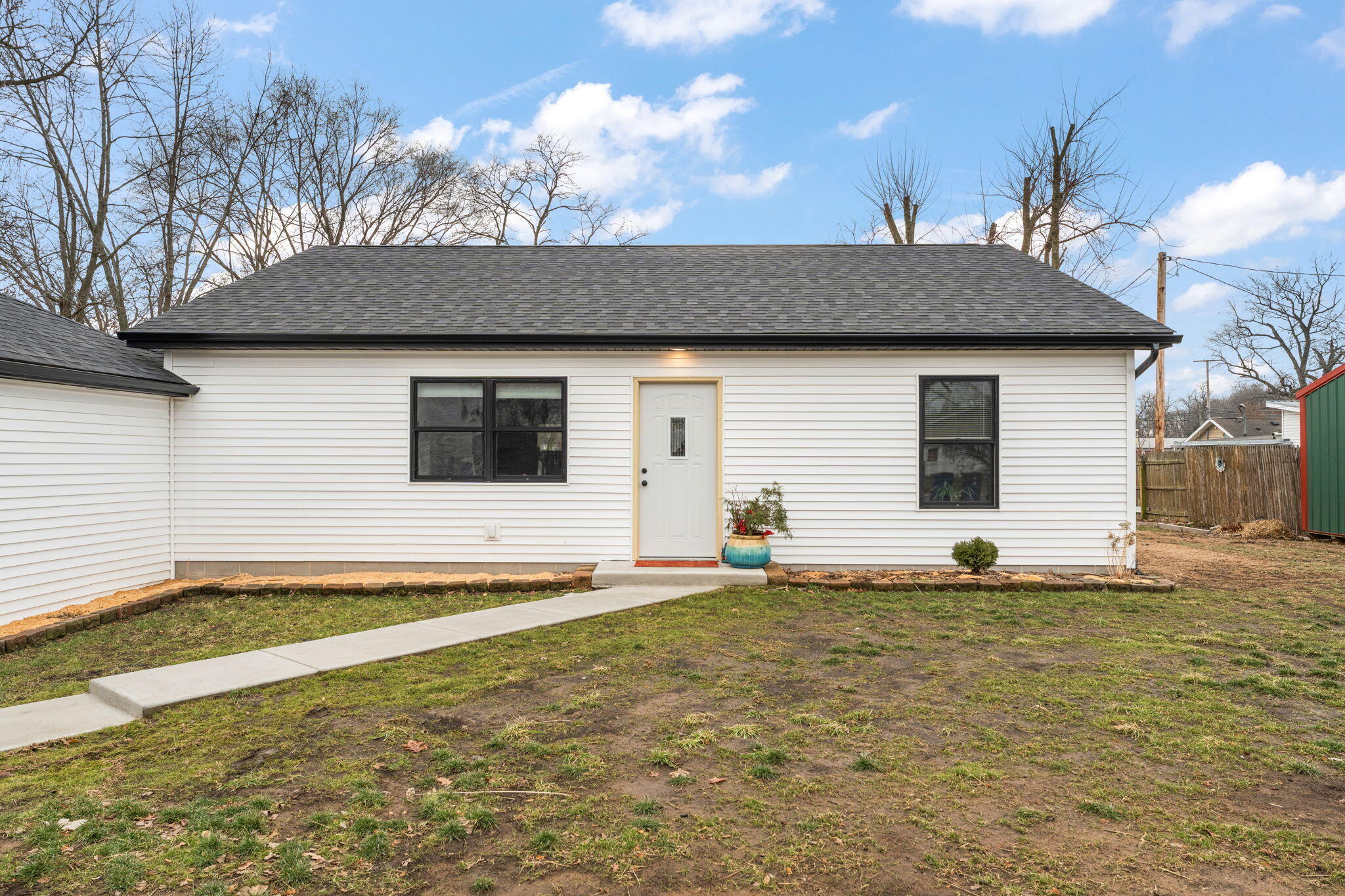 25 East Grove Street Wheatfield, IN 46392 - Photo 20 of 21 a house view with a garden space