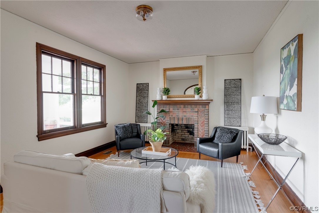 1700 Midview Road Henrico, VA 23231 - Photo 15 of 50 a living room with furniture and a fireplace