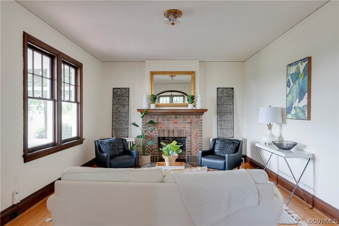 1700 Midview Road Henrico, VA 23231 - Photo 17 of 50 a living room with furniture a fireplace and a window