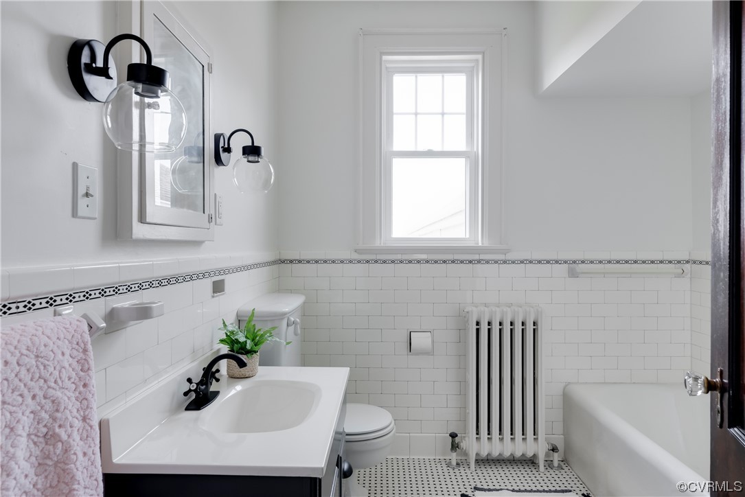 1700 Midview Road Henrico, VA 23231 - Photo 19 of 50 a bathroom with a sink and a bathtub