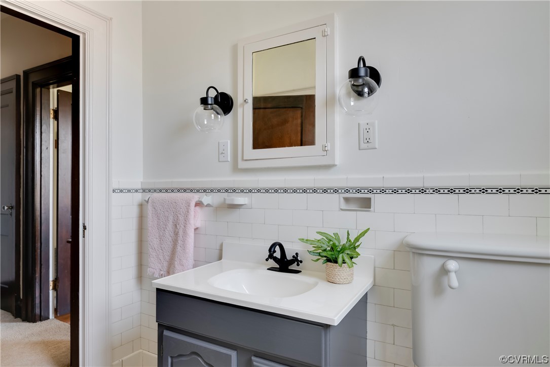 1700 Midview Road Henrico, VA 23231 - Photo 20 of 50 a bathroom with a sink and a mirror