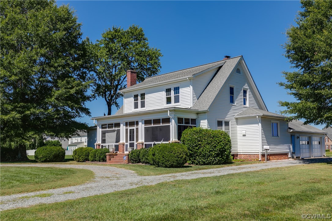 1700 Midview Road Henrico, VA 23231 - Photo 2 of 50 a front view of a house with a garden