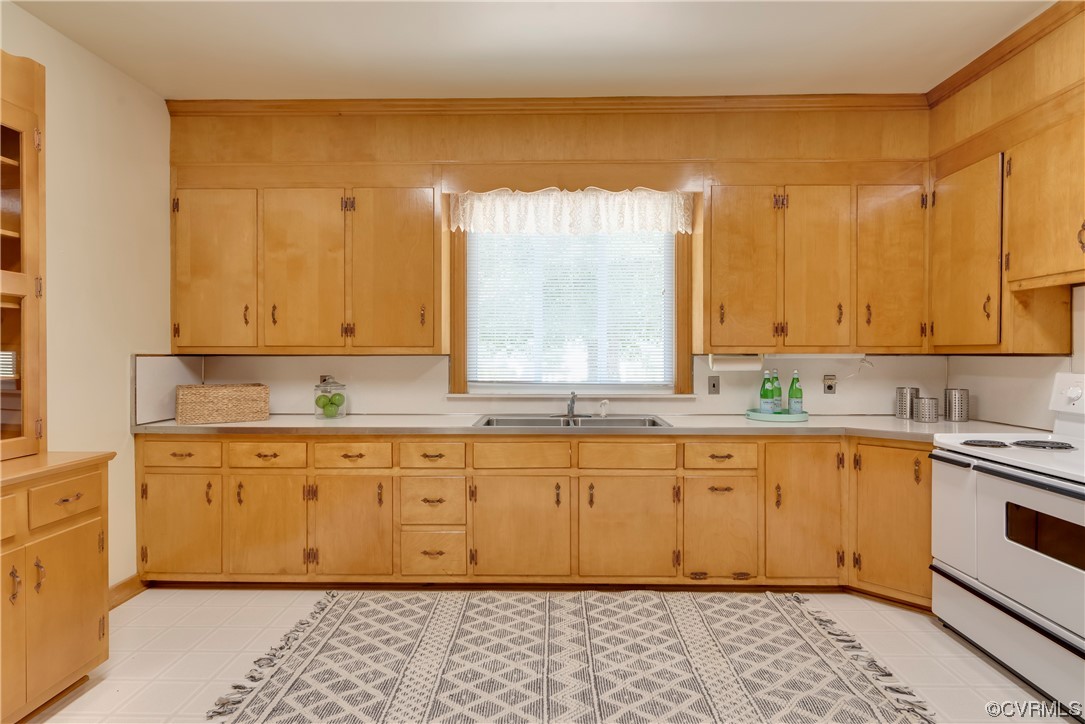 1700 Midview Road Henrico, VA 23231 - Photo 28 of 50 a kitchen with a sink cabinets and window