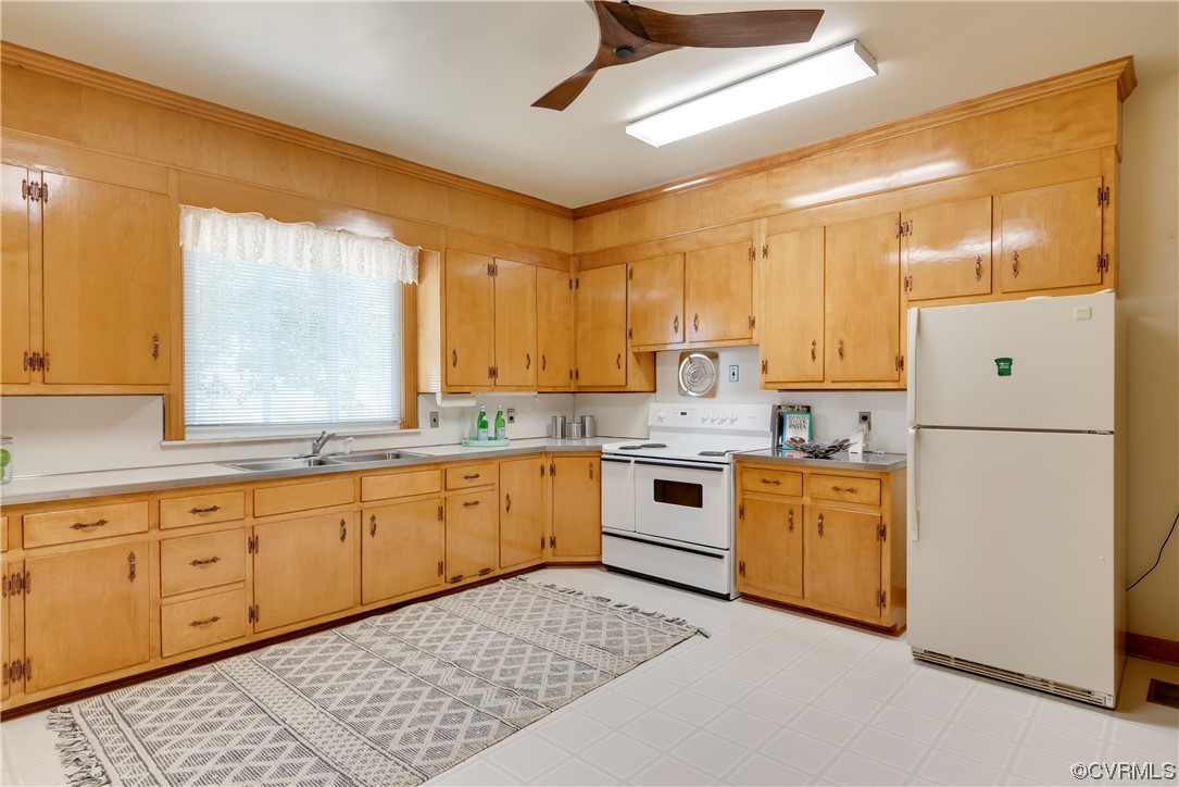 1700 Midview Road Henrico, VA 23231 - Photo 30 of 50 a kitchen with granite countertop appliances a sink and a refrigerator