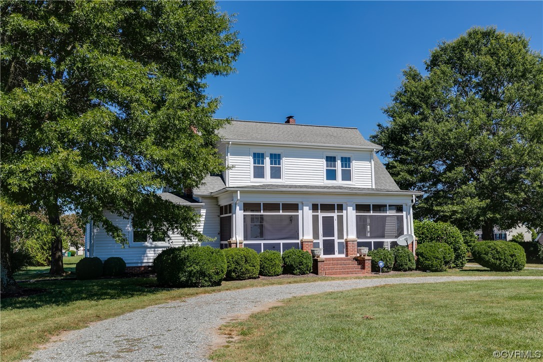 1700 Midview Road Henrico, VA 23231 - Photo 3 of 50 front view of a brick house next to a yard