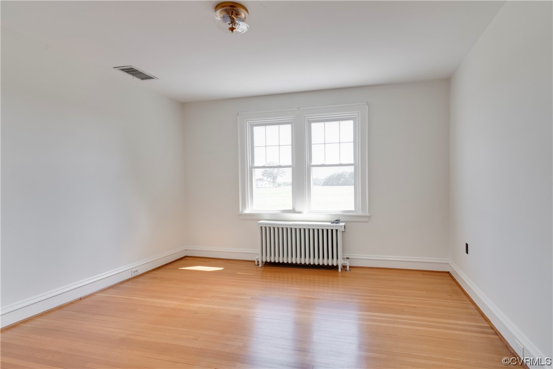 1700 Midview Road Henrico, VA 23231 - Photo 40 of 50 an empty room with wooden floor and windows