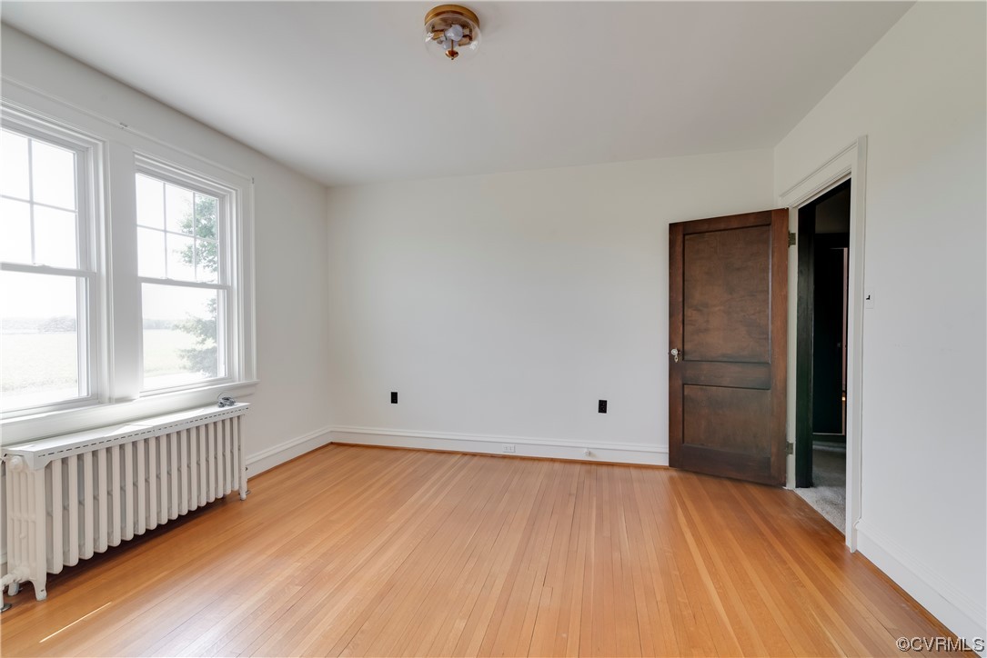 1700 Midview Road Henrico, VA 23231 - Photo 42 of 50 an empty room with wooden floor and windows